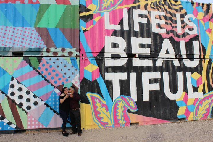 Photo opportunity by one of dozens of art murals on East Fremont Street